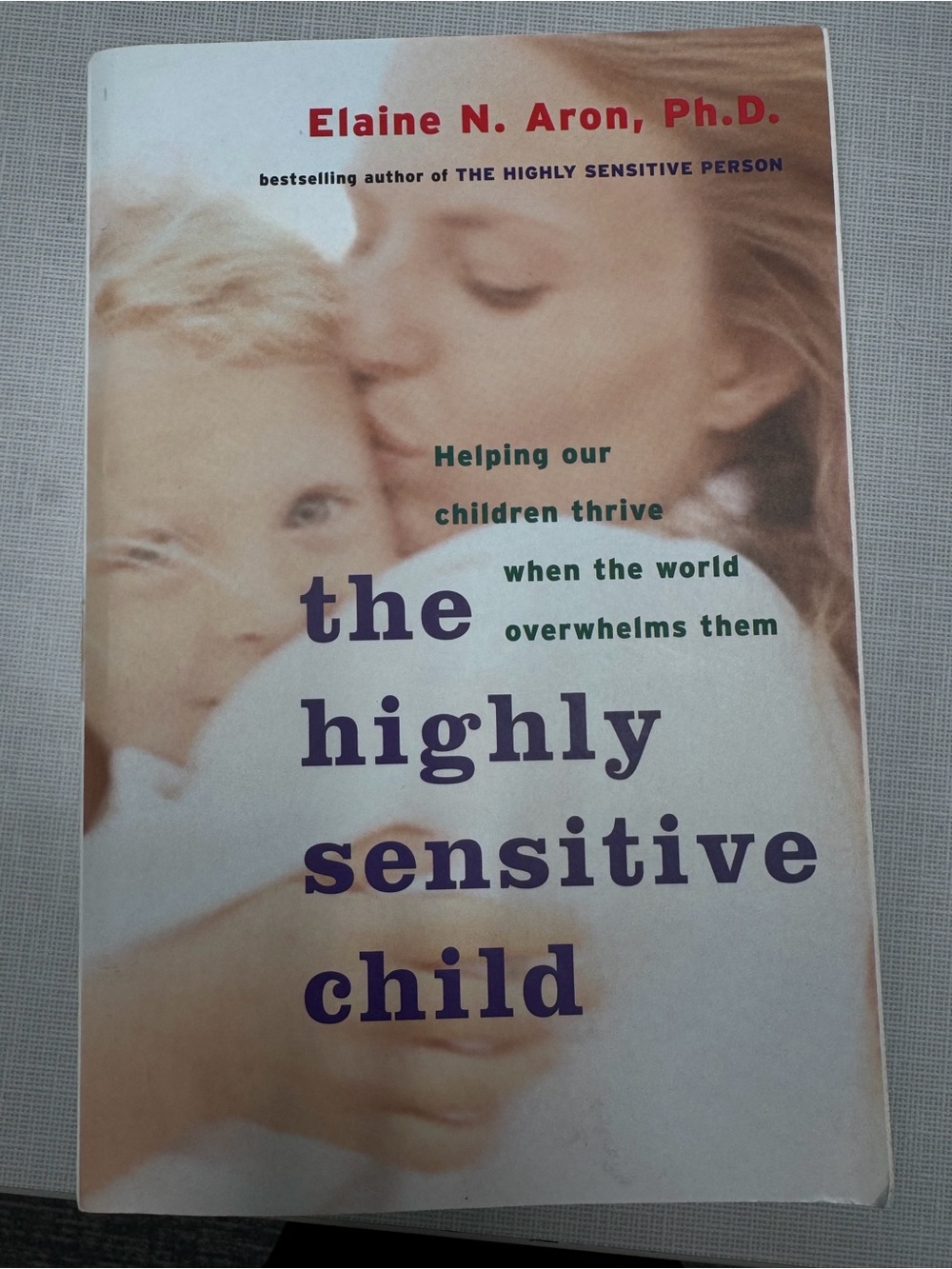 The Highly Sensitive Child by Elaine N. Aron, Ph.D. - White/Purple Cover. New